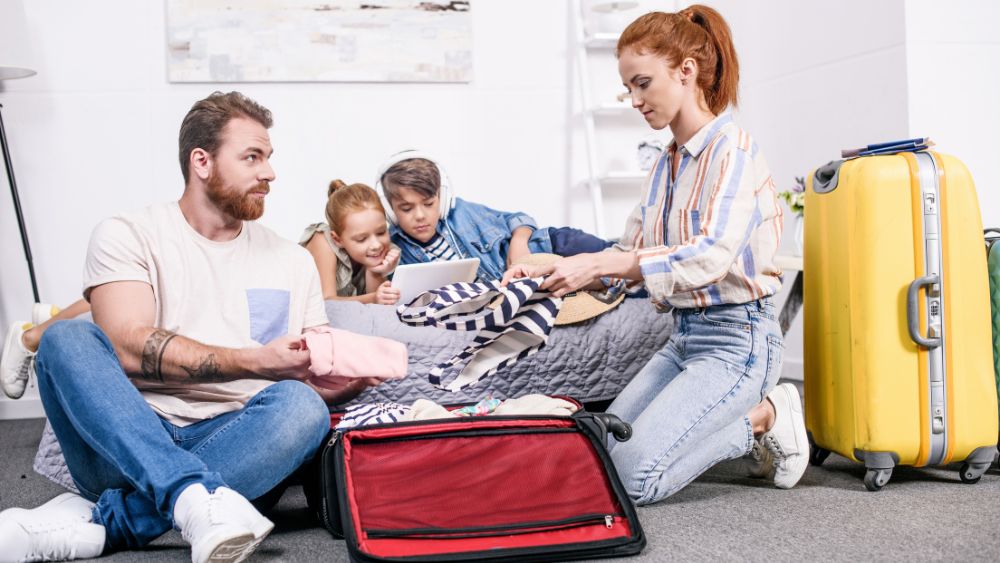 Family checking luggage before departure